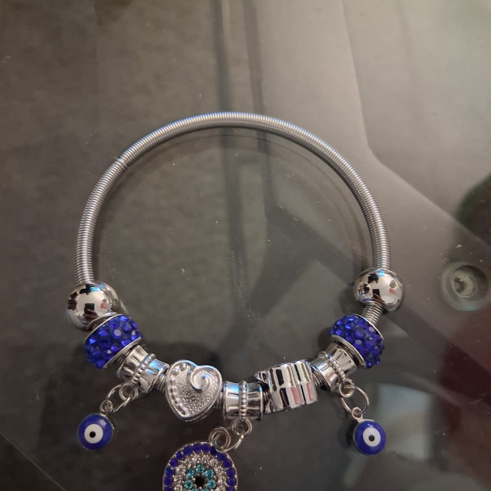 Elegant Blue And Silver Tone Charm Bracelet